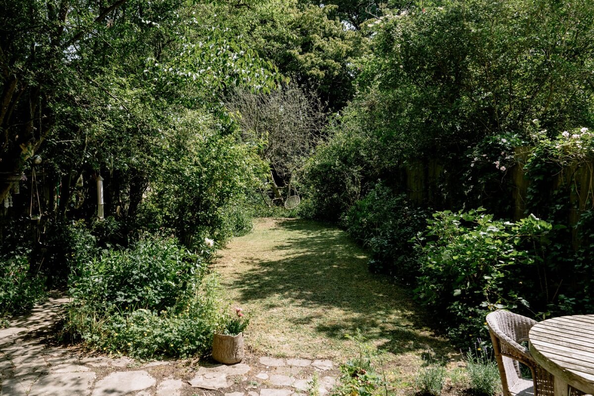 A London Home with Color Accents and a Secret Garden Shed 17 green-garden-lawn-seating-london-nordroom