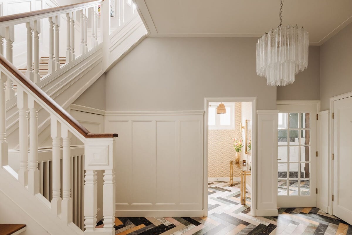 A Grand Renovated Family Home in Amsterdam 11 hallway-colorful-marble-floor-herringbone-pattern-nordroom