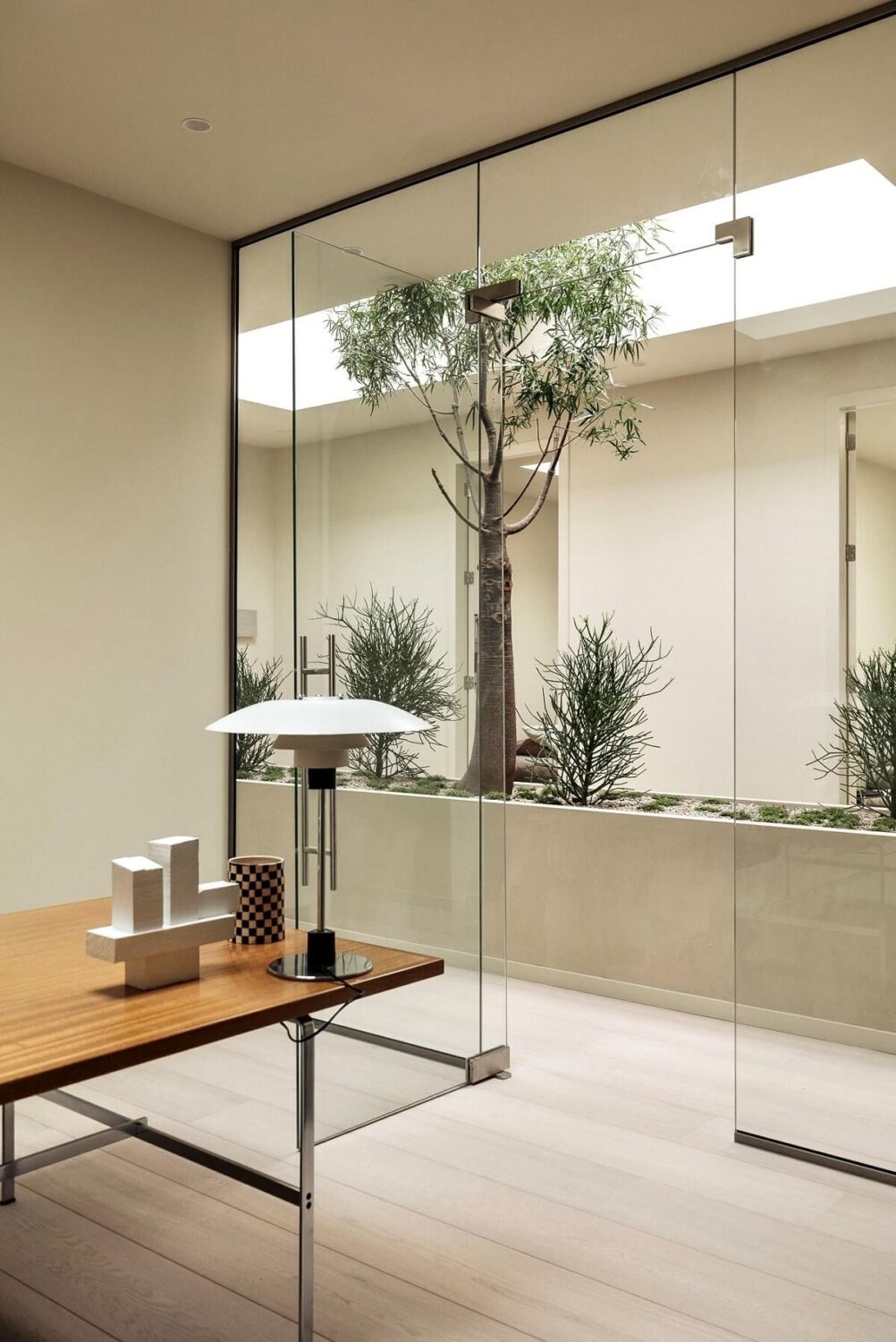 A Modern Home in a Historic Amsterdam Canal House 8 home-office-glass-wall-indoor-garden-nordroom