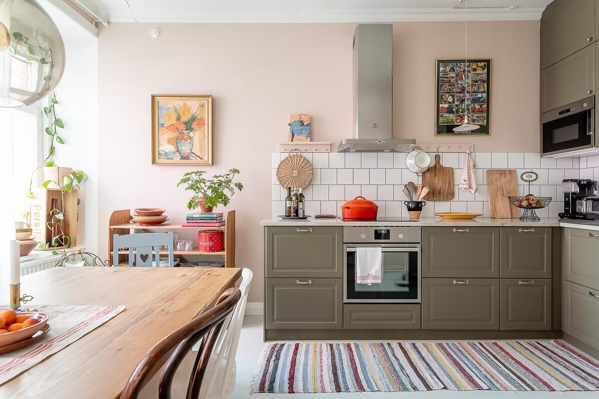 A Bright Swedish Apartment with William Morris Wallpaper 8 ikea-kitchen-dining-table-striped-runner-pink-walls-nordroom