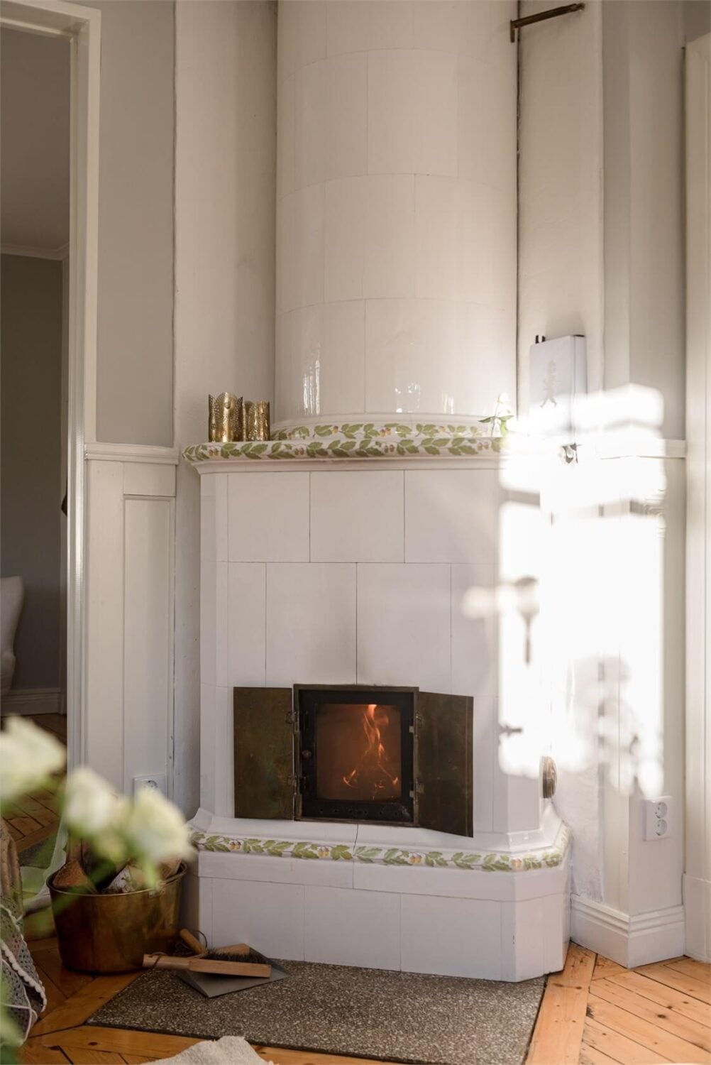 Natural Light in a Family Home in Sweden 7 kakelugn-swedish-tiled-fireplace-nordroom