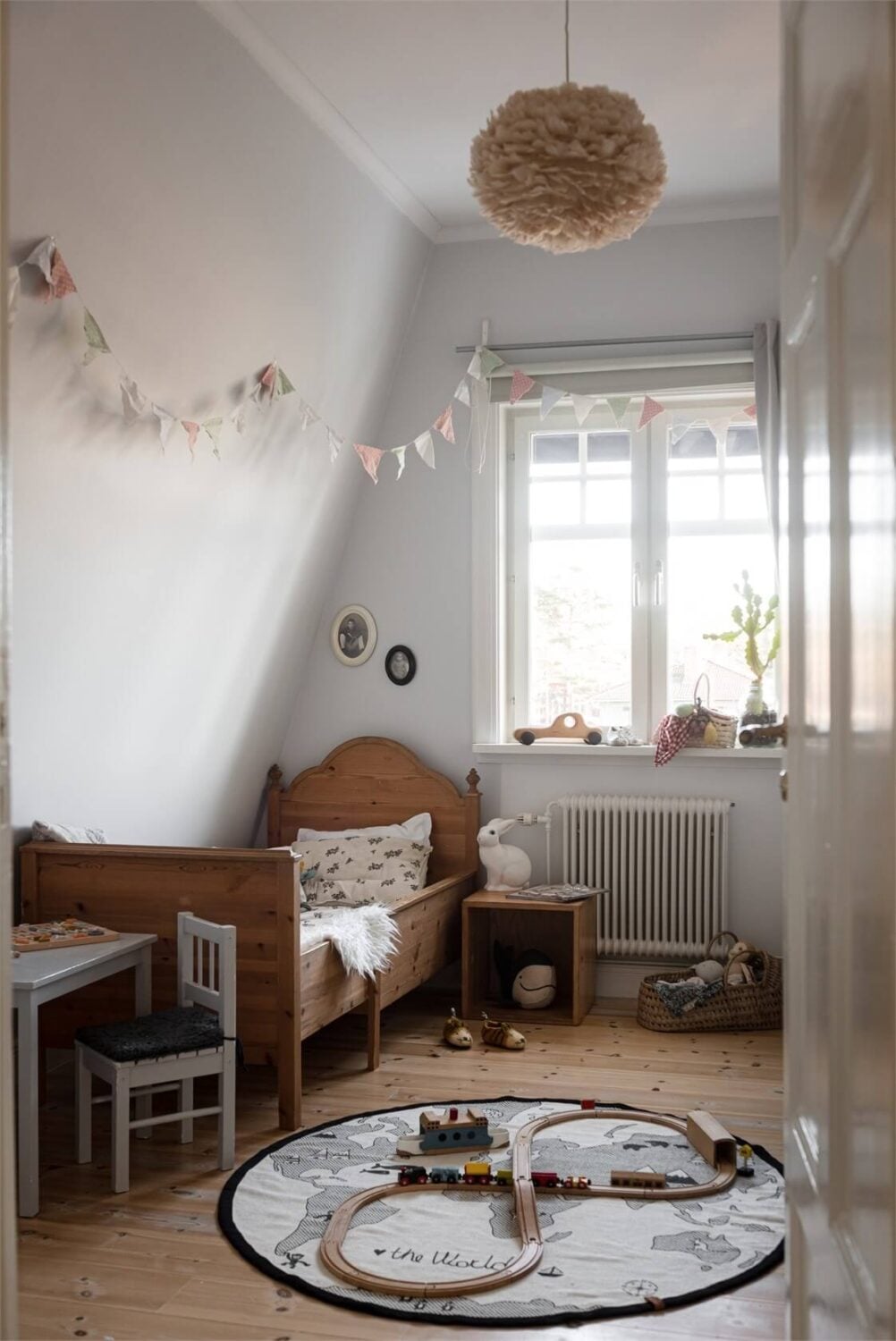 Natural Light in a Family Home in Sweden 16 kids-bedroom-slanted-wall-nordroom