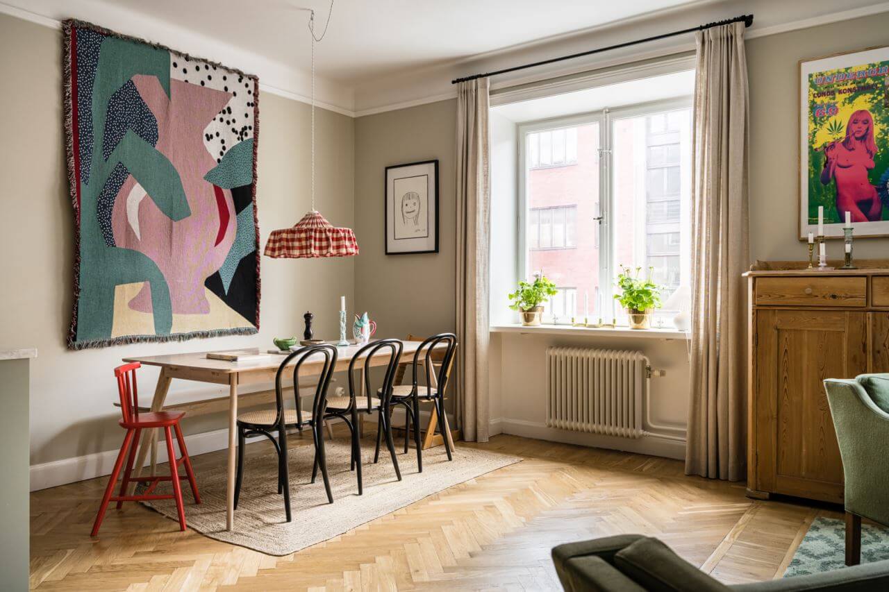 Green Color Accents in a Beautiful Historic Apartment 13 kitchen-dining-table-bench-large-artwork-nordroom