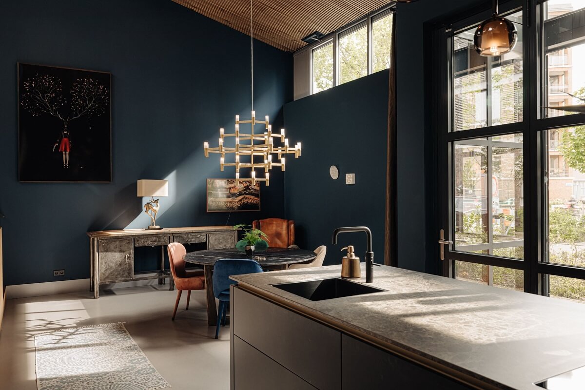 An Industrial Loft Home in Amsterdam 11 kitchen-island-navy-blue-wall-nordroom
