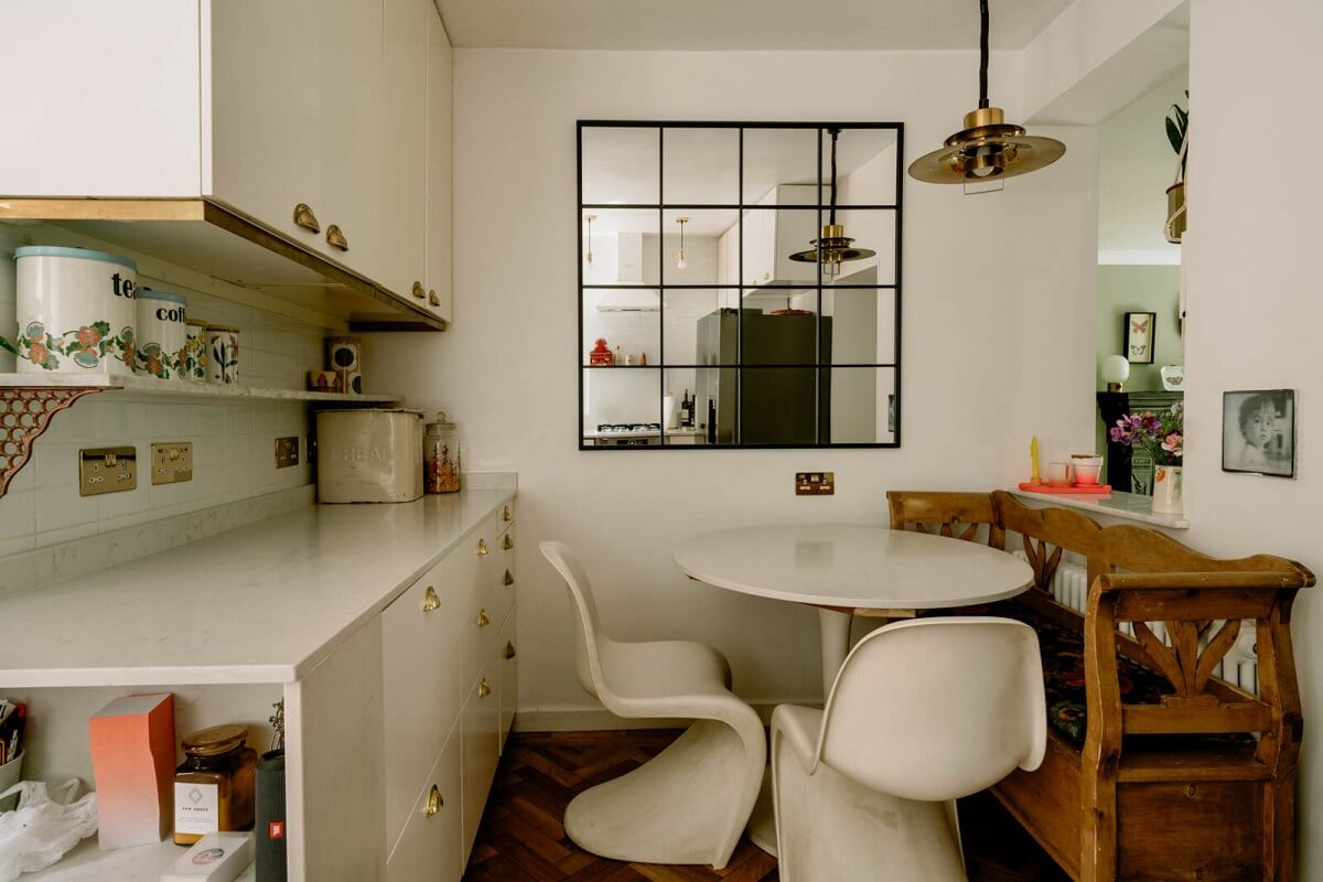 A London Home with Color Accents and a Secret Garden Shed 9 kitchen-small-round-dining-table-wooden-bench-nordroom