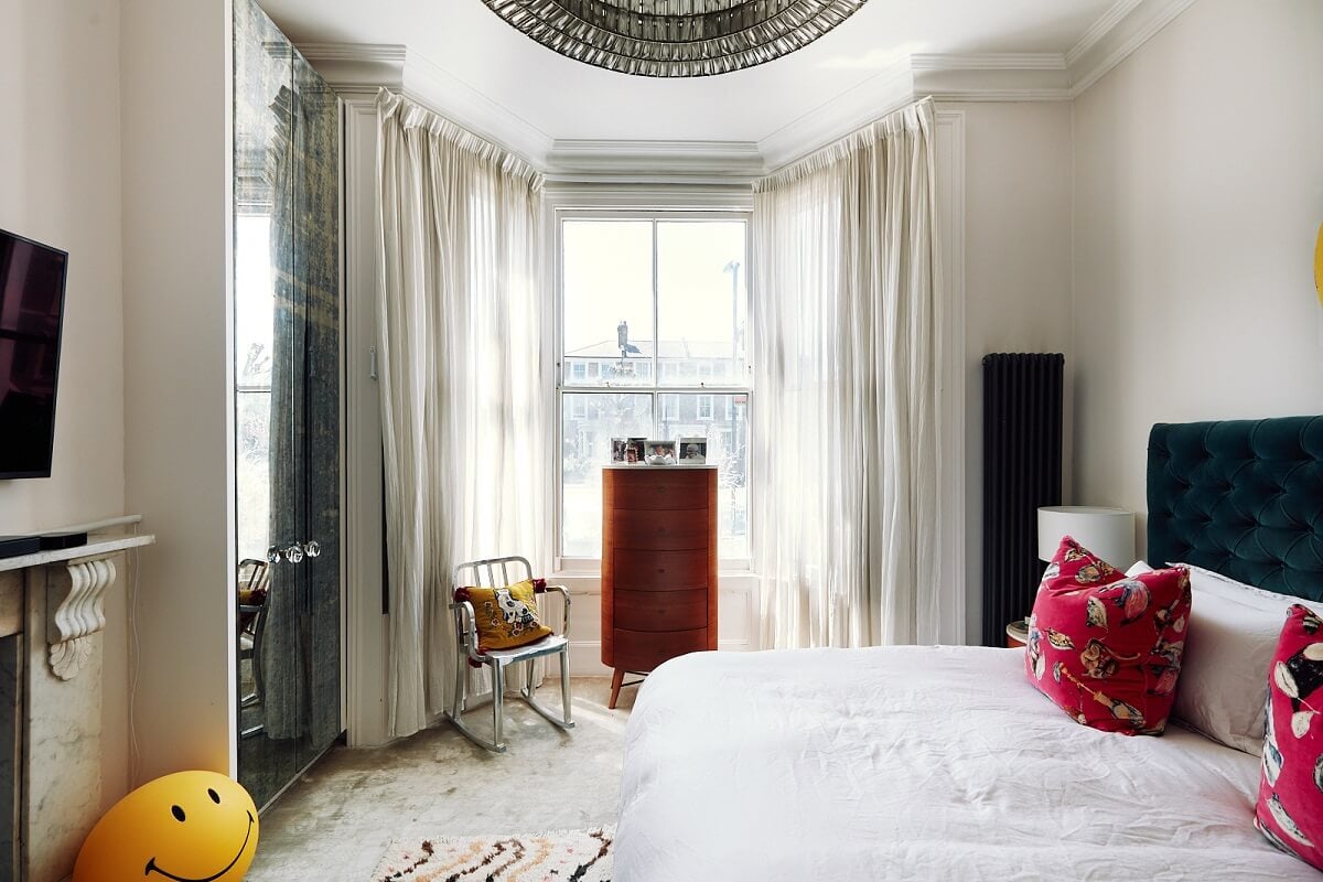A Pink Living Room in a London Maisonette 19 light-bedroom-bay-window-velvet-headboard-nordroom