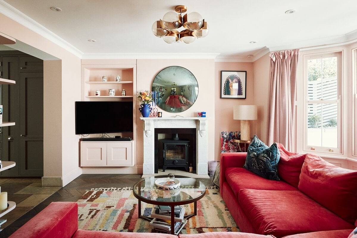 A Pink Living Room in a London Maisonette 3 living-room-light-pink-walls-dark-pink-couch-nordroom