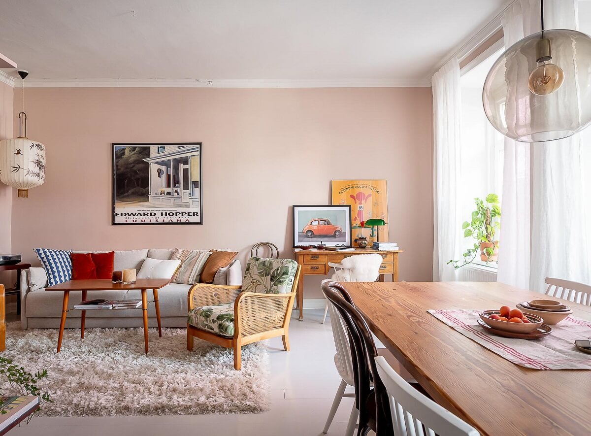 A Bright Swedish Apartment with William Morris Wallpaper 6 living-room-with-dining-table-light-pink-walls-nordroom