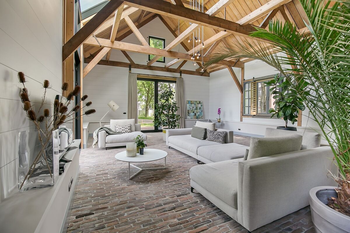 A Dutch Barn House with Brick Floors and Wooden Ceilings 4 living-room-wooden-ceiling-barn-house-nordroom