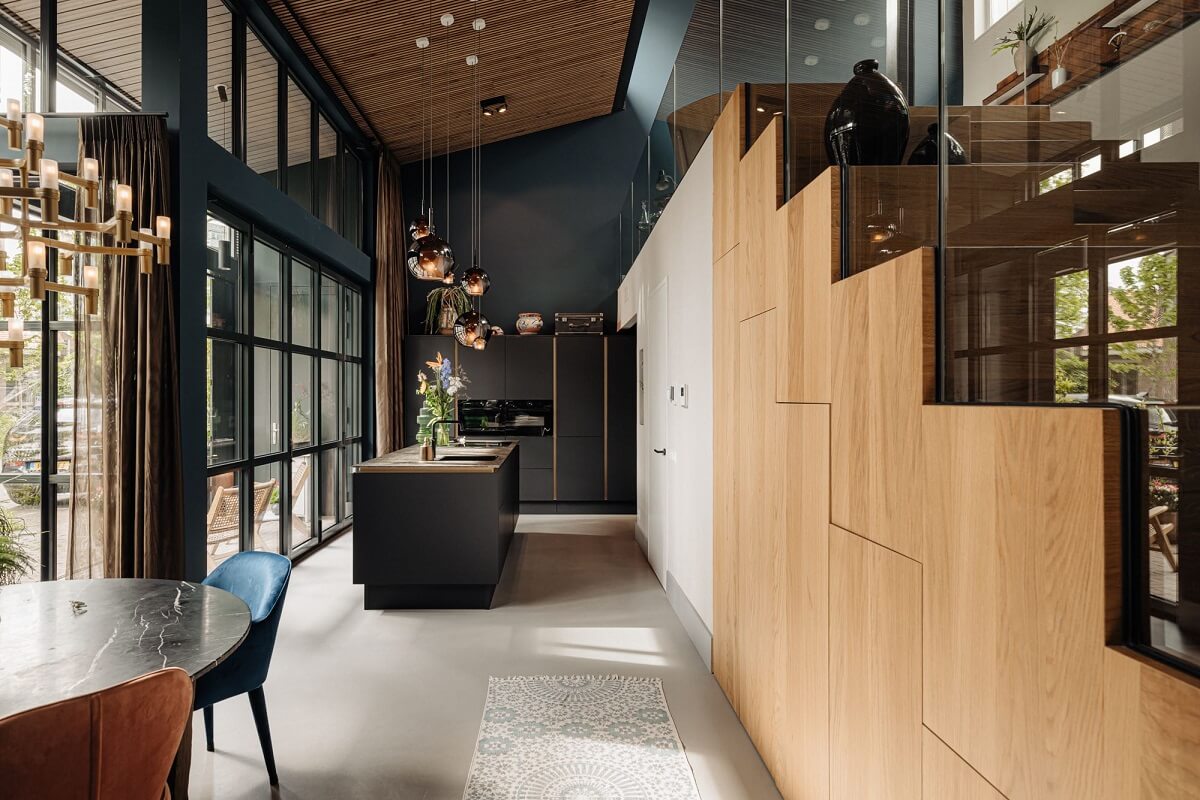 An Industrial Loft Home in Amsterdam 8 loft-apartment-kitchen-storage-staircase-nordroom