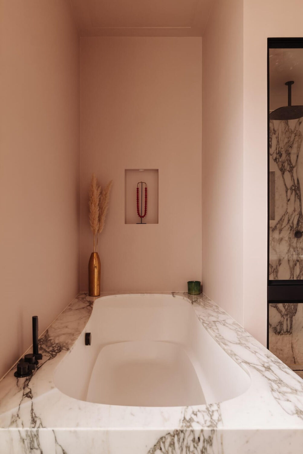 A Grand Renovated Family Home in Amsterdam 20 marble-bath-soft-pink-walls-nordroom