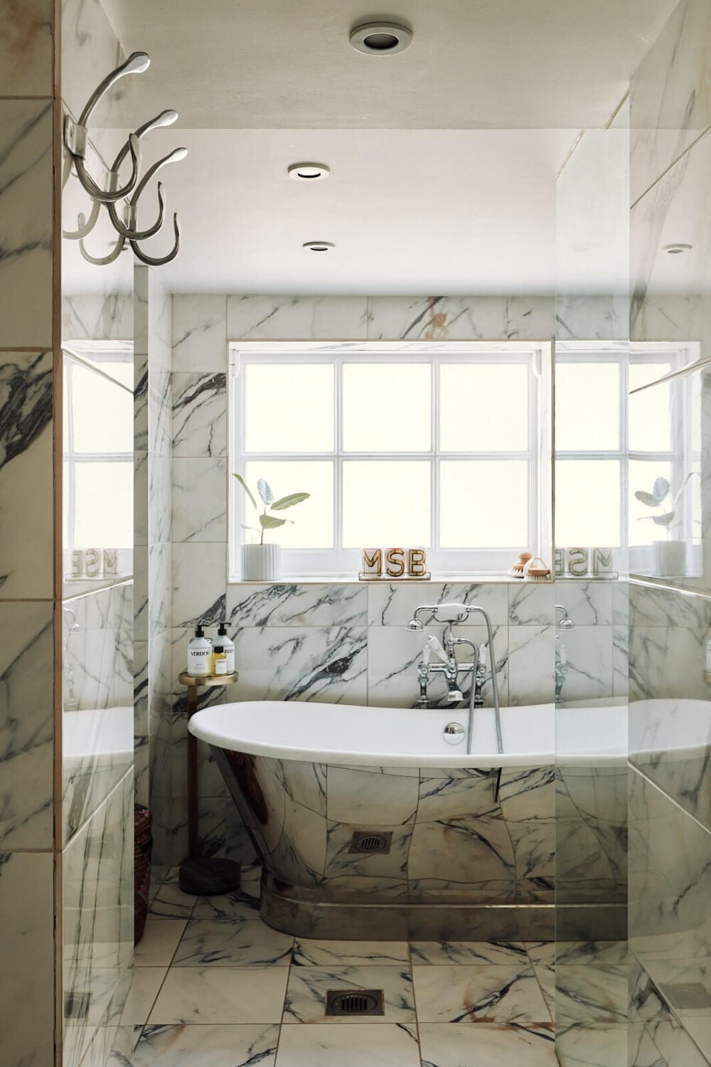 A Pink Living Room in a London Maisonette 16 marble-bathroom-nickel-slipper-bath-nordroom