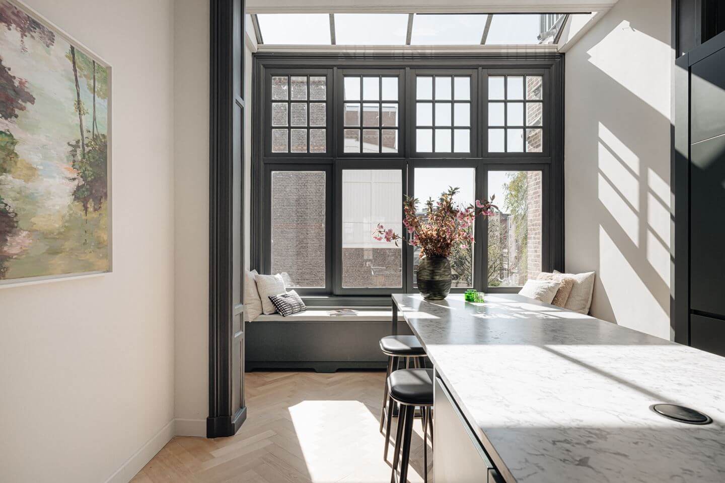 A Monochrome Duplex Apartment in Amsterdam 10 modern-gray-kitchen-window-seat-nordroom