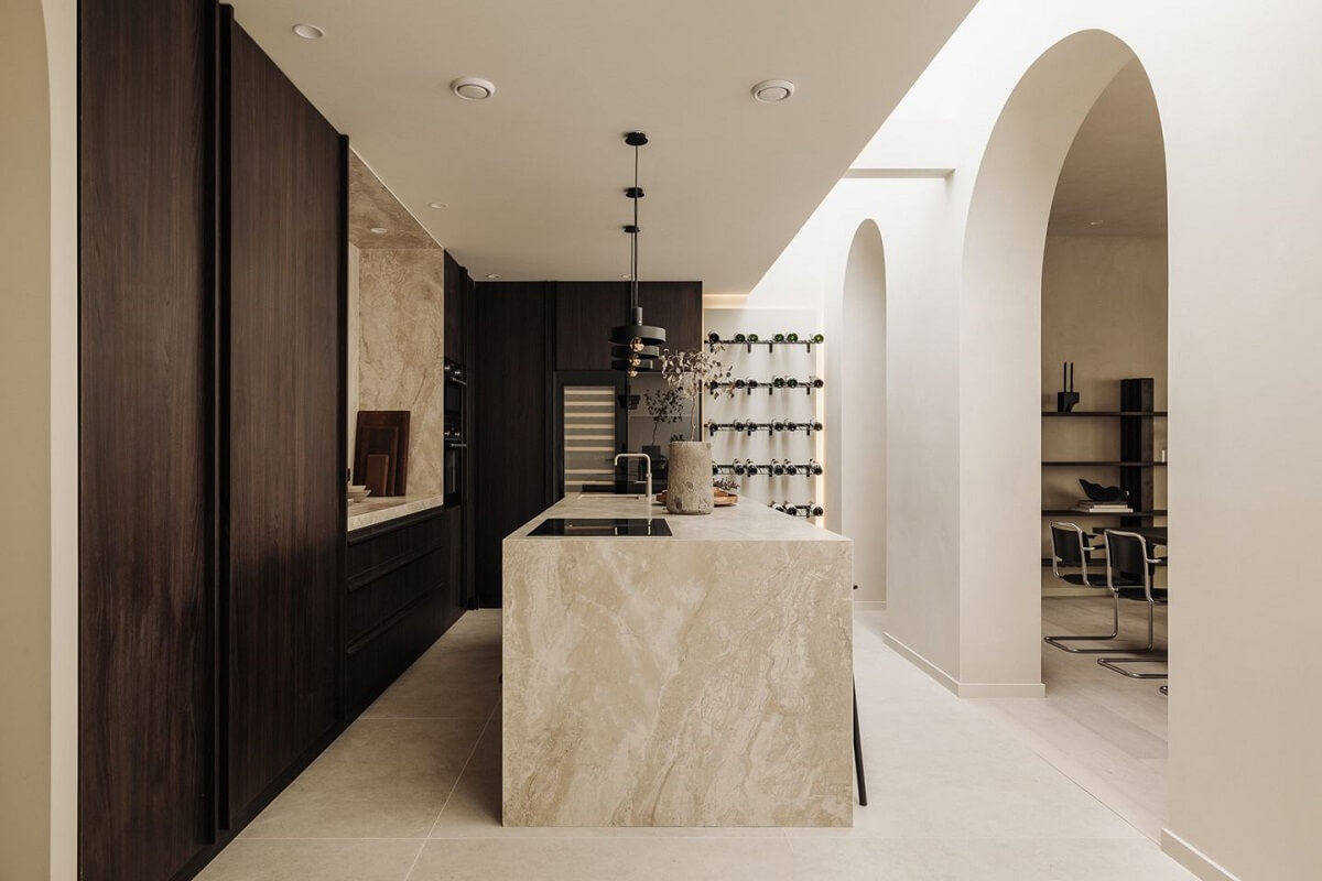 A Modern Home in a Historic Amsterdam Canal House 5 modern-kitchen-marble-island-arched-doorway-nordroom