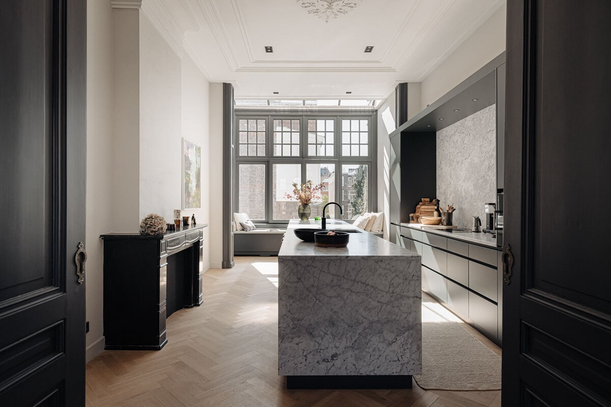 A Monochrome Duplex Apartment in Amsterdam 7 modern-kitchen-marble-island-dark-gray-cabinets-nordroom