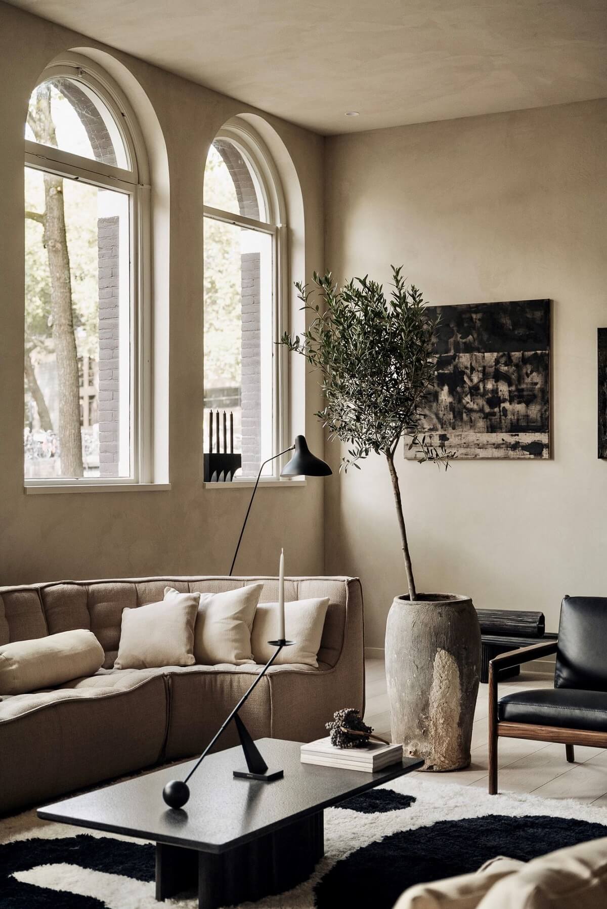 modern-light-gray-living-room-arched-windows-nordroom