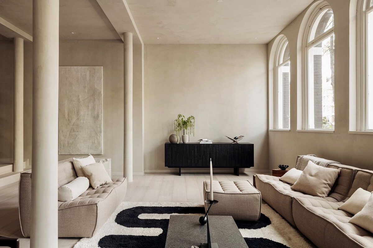 A Modern Home in a Historic Amsterdam Canal House 3 modern-monochrome-living-room-arched-windows-nordroom