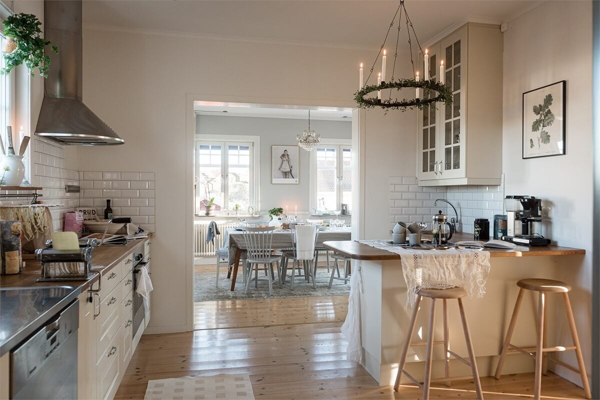 Natural Light in a Family Home in Sweden 11 open-plan-kitchen-breakfast-bar-nordroom