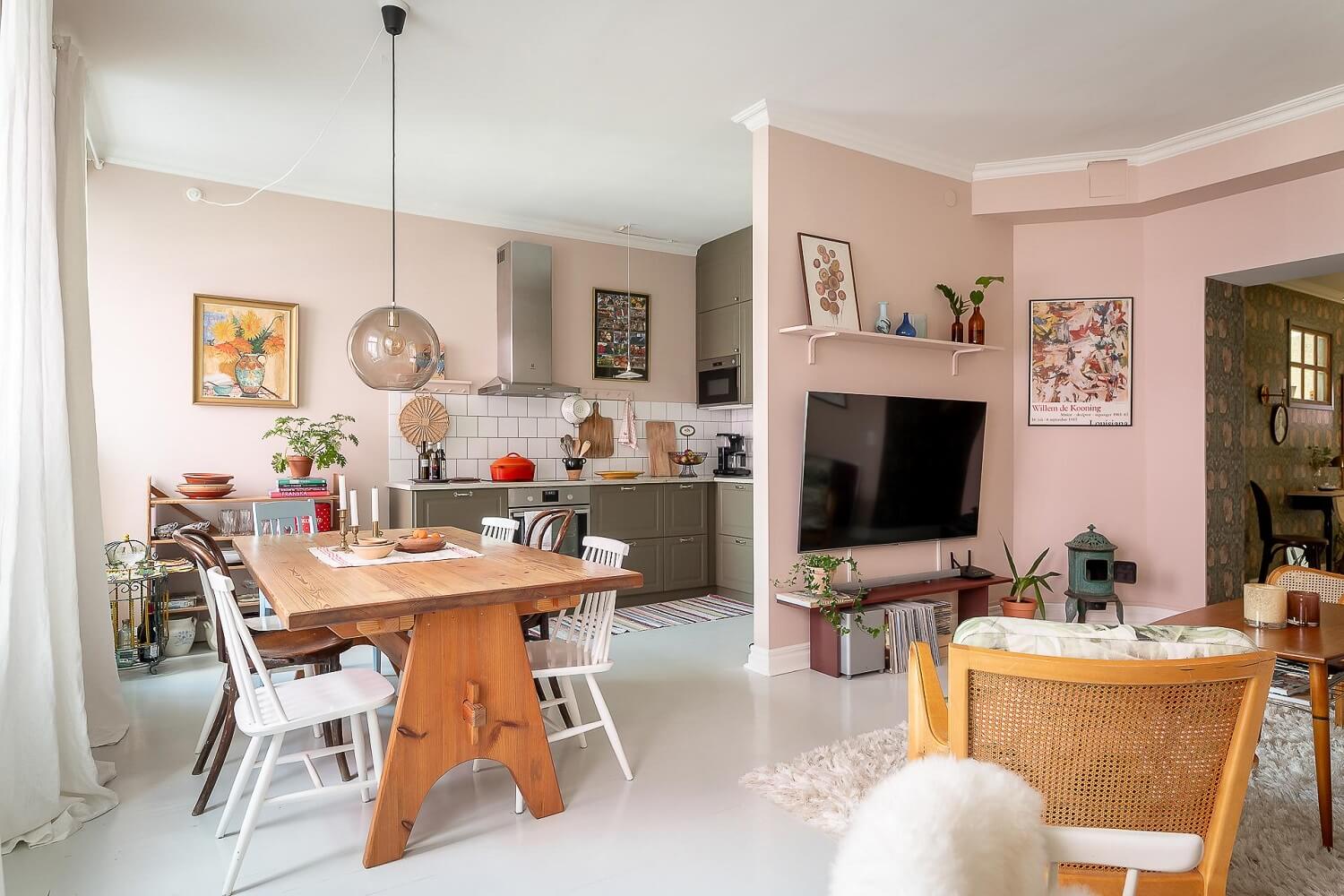 A Bright Swedish Apartment with William Morris Wallpaper 1 open-plan-living-room-kitchen-large-wooden-dining-table-nordroom