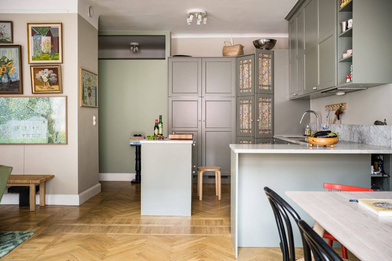 Green Color Accents in a Beautiful Historic Apartment 10 open-plan-living-space-kitchen-wooden-floor-nordroom