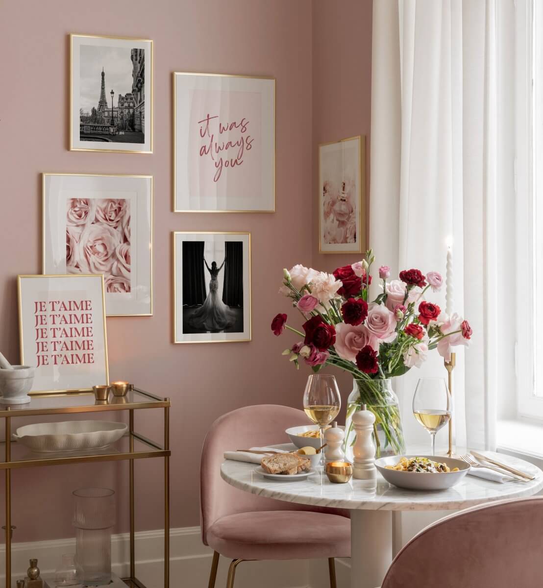 Barbiecore Interiors: The New Colorful & Fun Design Trend 13 pink-room-florals-round-dining-table-gallery-wall-nordroom