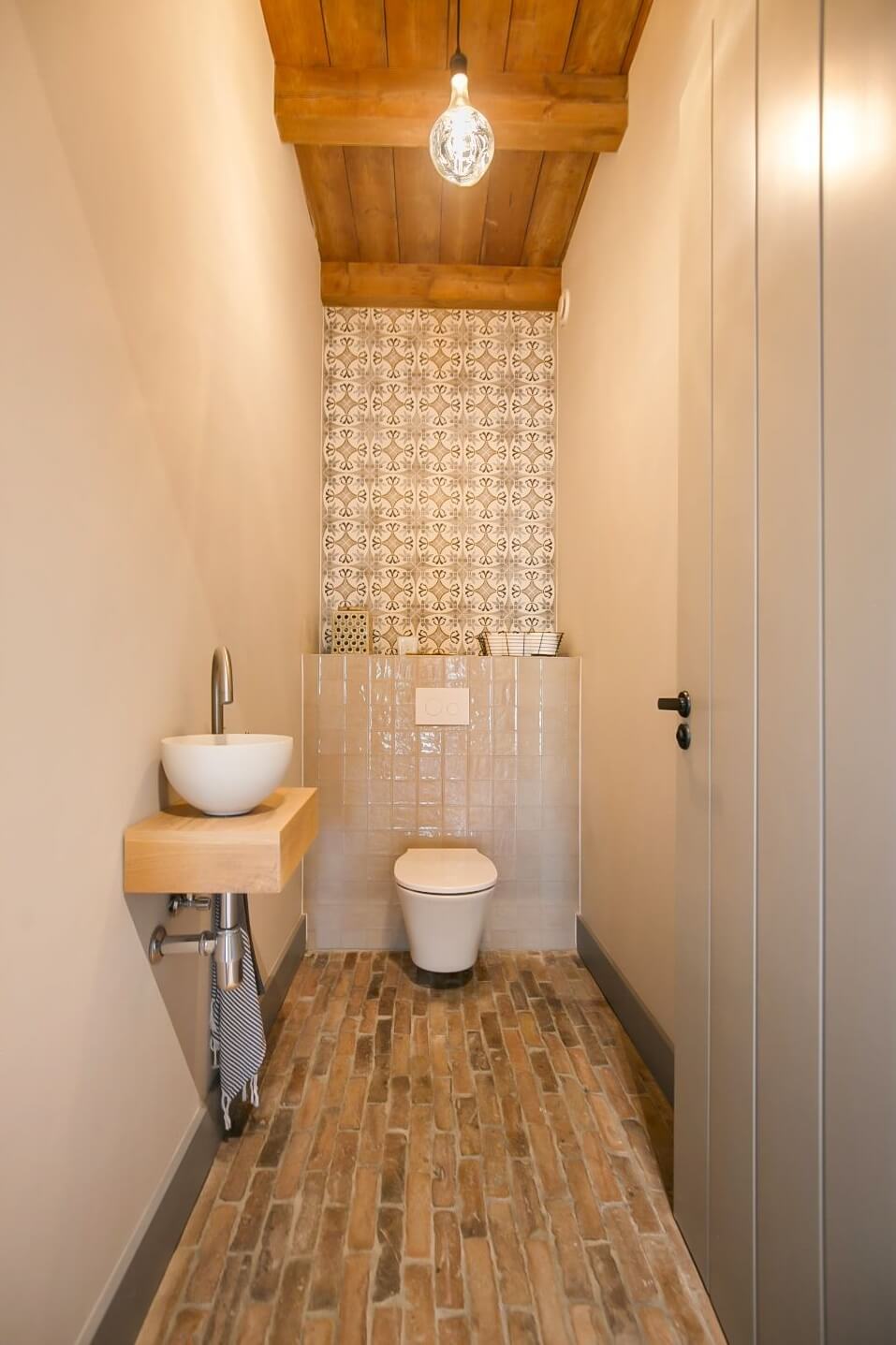 A Dutch Barn House with Brick Floors and Wooden Ceilings 15 powder-room-brick-floor-wooden-ceiling-nordroom