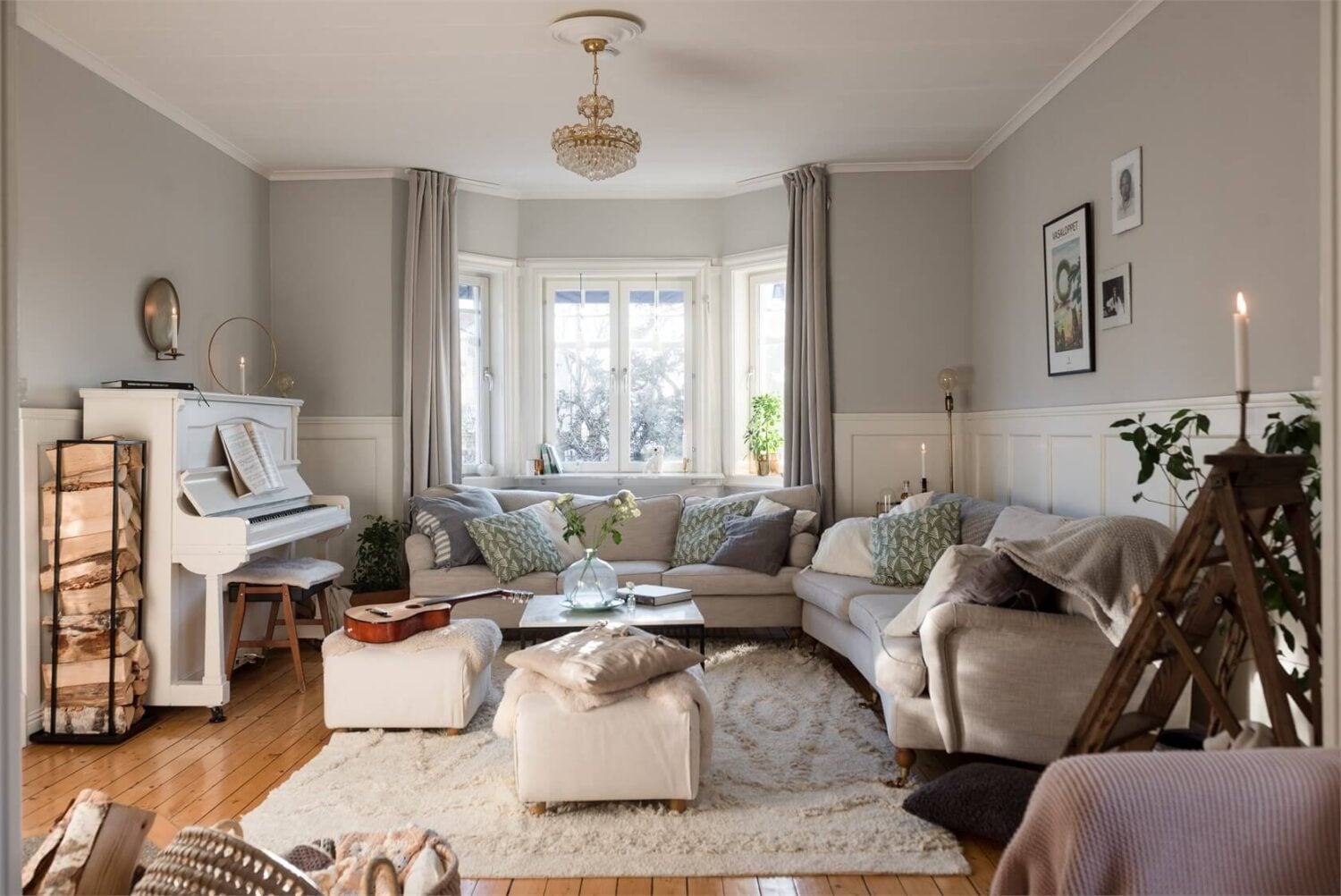 Natural Light in a Family Home in Sweden 5 scandi-living-room-light-gray-walls-wooden-floor-nordroom