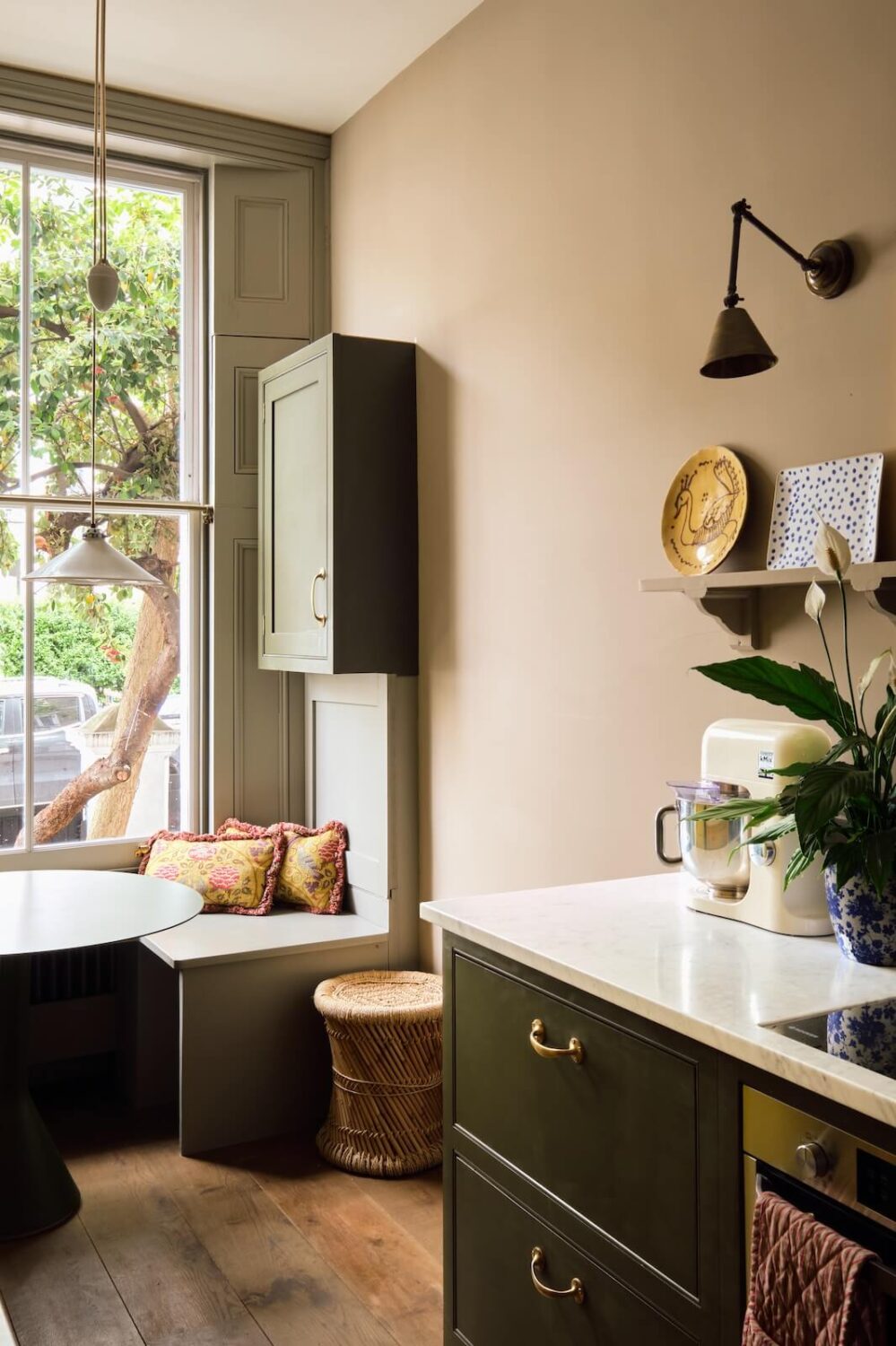 Bold Colors and Light Rooms in a Historic Apartment 8 serene-kitchen-window-seating-nordroom