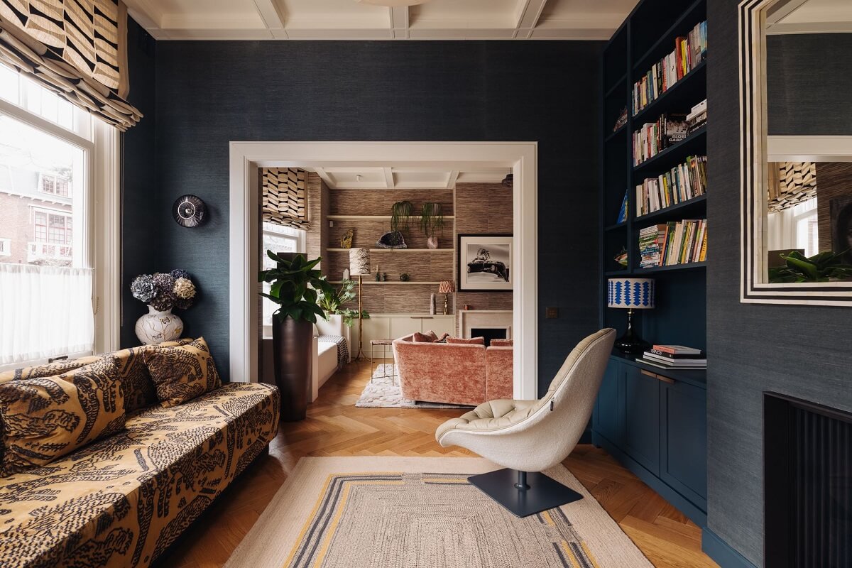 A Grand Renovated Family Home in Amsterdam 10 sitting-room-blue-walls-built-in-bookshelves-nordroom