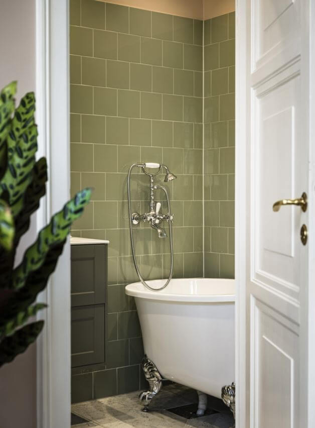 Green Color Accents in a Beautiful Historic Apartment 21 small-bathroom-with-clawfoot-bath-green-tiles-nordroom