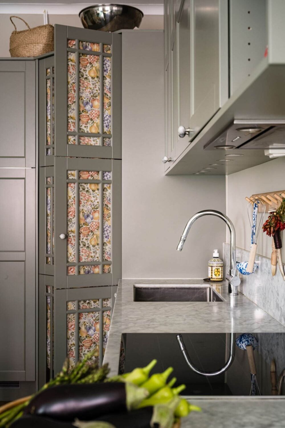 Green Color Accents in a Beautiful Historic Apartment 12 small-pantry-doors-fabric-nordroom