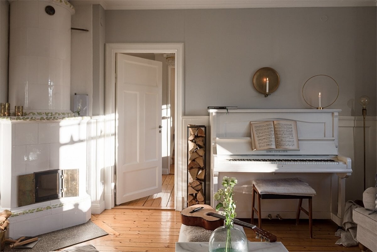 Natural Light in a Family Home in Sweden 8 swedish-fireplace-wooden-floor-nordroom