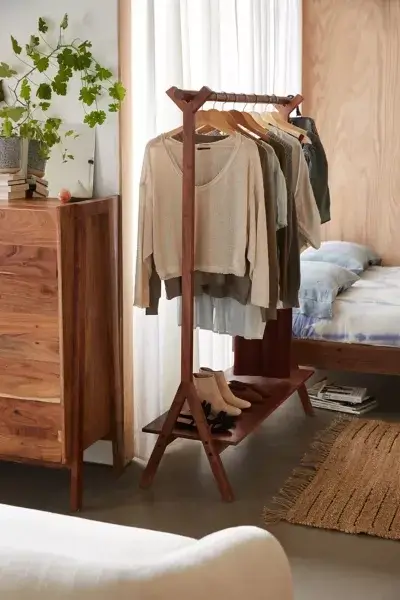 43 Ideas To Divide a Studio Apartment Into Multiple Rooms 27 studio apartment clothing rack room divider