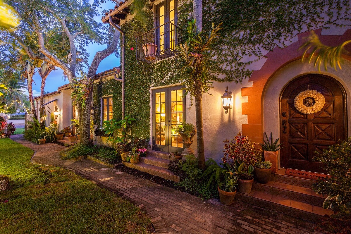 A Beautiful Spanish Style Home in Florida 37 arched-wooden-front-door