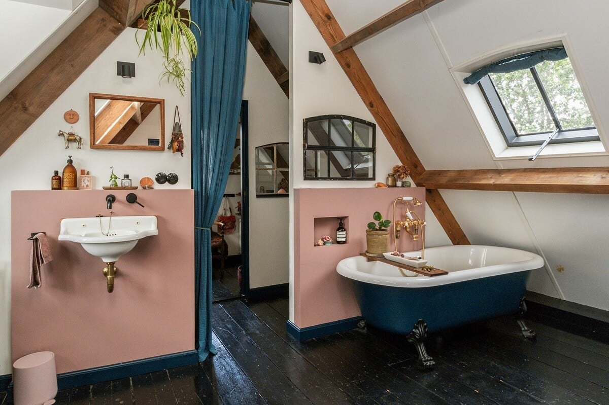 89 Pink Bathroom Ideas: From Hot Pink Walls to Blush Tiles 21 bahtroom-pink-half-painted-wall-blue-freestanding-bath-slanted-ceilings-nordroom