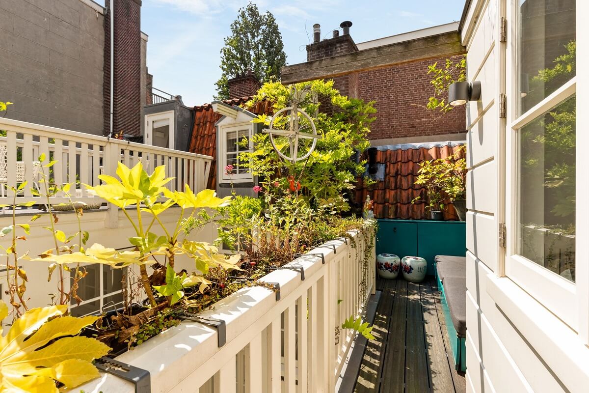 A Family Home in a Historic Canal House 26 balcony-greenery-canal-house