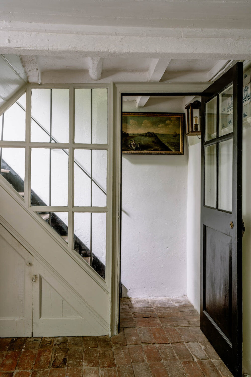 A Unique Historic House Near the English Coast 15 basement-kitchen-glass-wood-wall-nordroom