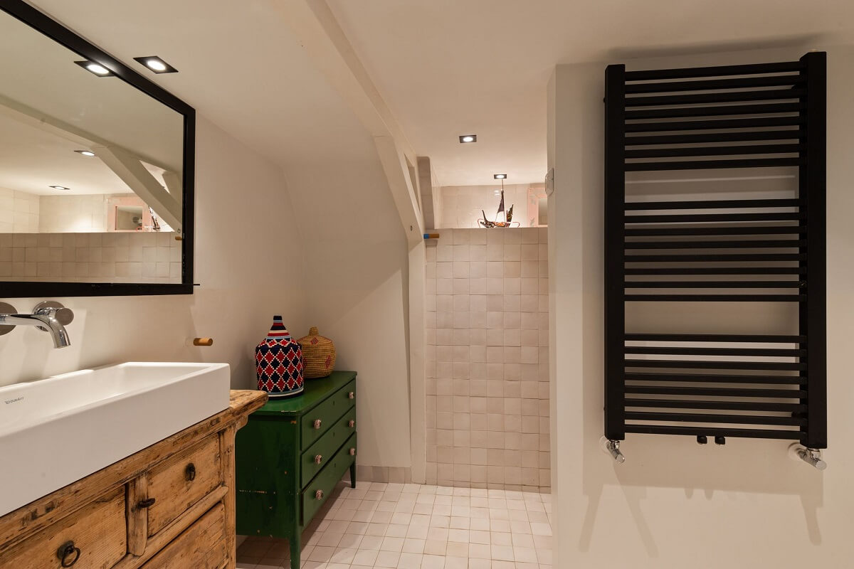 A Family Home in a Historic Canal House 24 bathroom-green-cabinet-canal-house