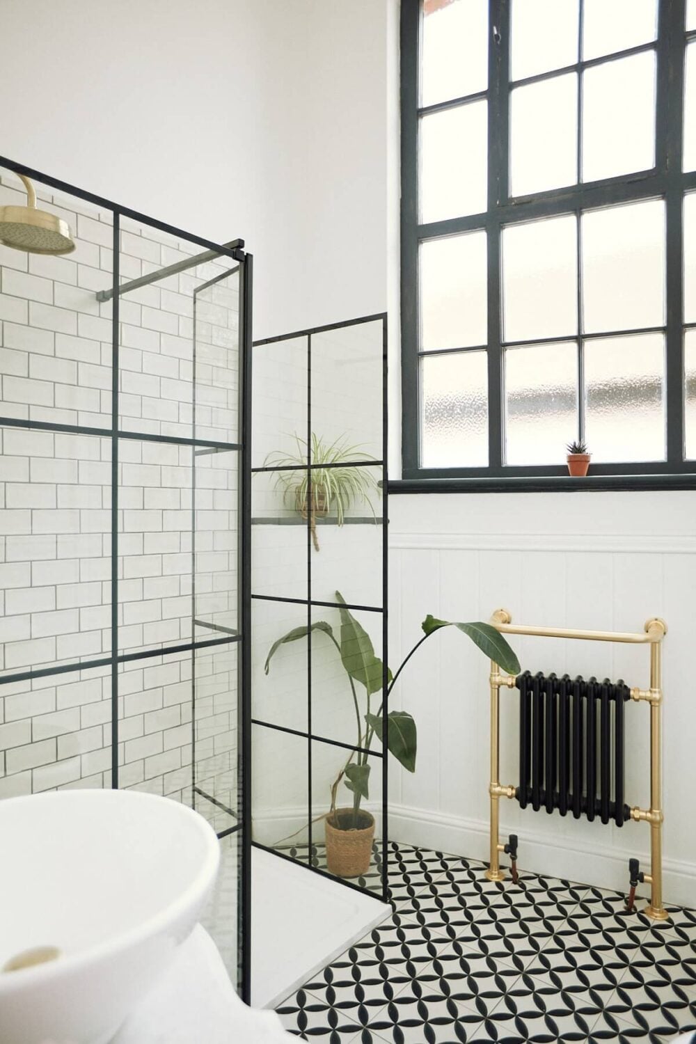 Loft Style Spaces in a Renovated Salvation Army Hall 16 bathroom-high-ceiling-black-white-floor-tiles-steel-glass-shower-wall-nordroom
