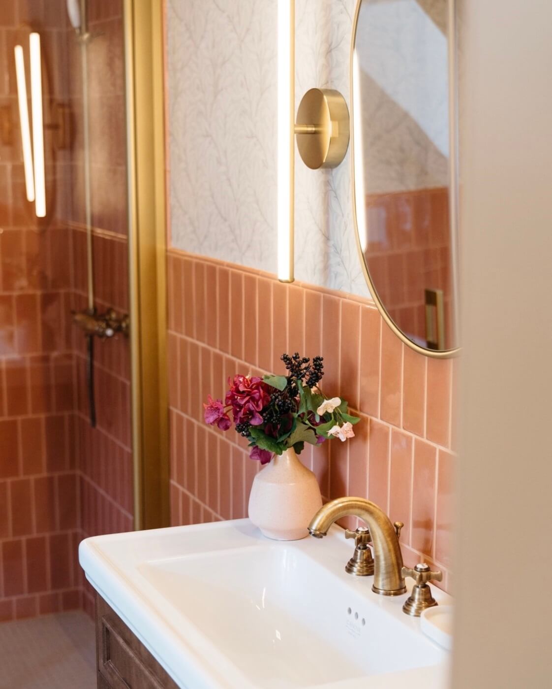 89 Pink Bathroom Ideas: From Hot Pink Walls to Blush Tiles 111 bathroom-pink-tiles-brass-accents-nordroom