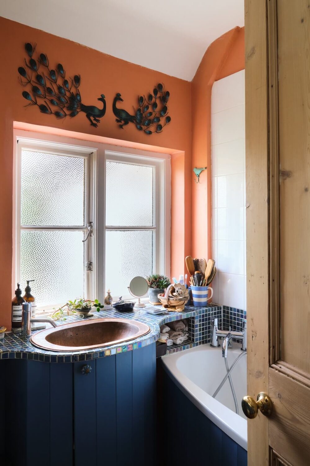 An English Cottage with Blue Color Accents 15 bathroom-pink-walls-blue-cladding-nordroom