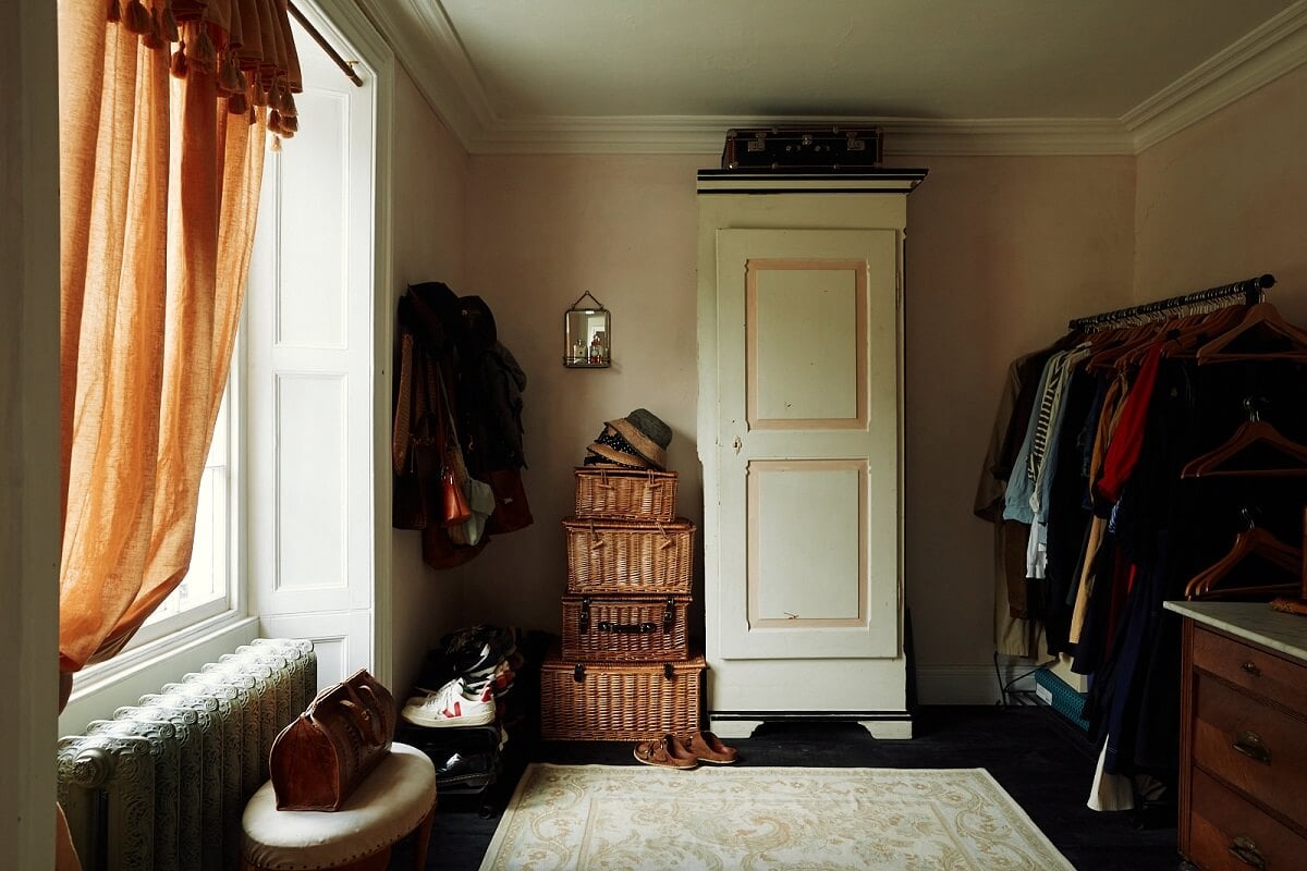 An English Cottage with a Perfect Kitchen 21 bedroom-closet-space-terracotta-curtains-nordroom