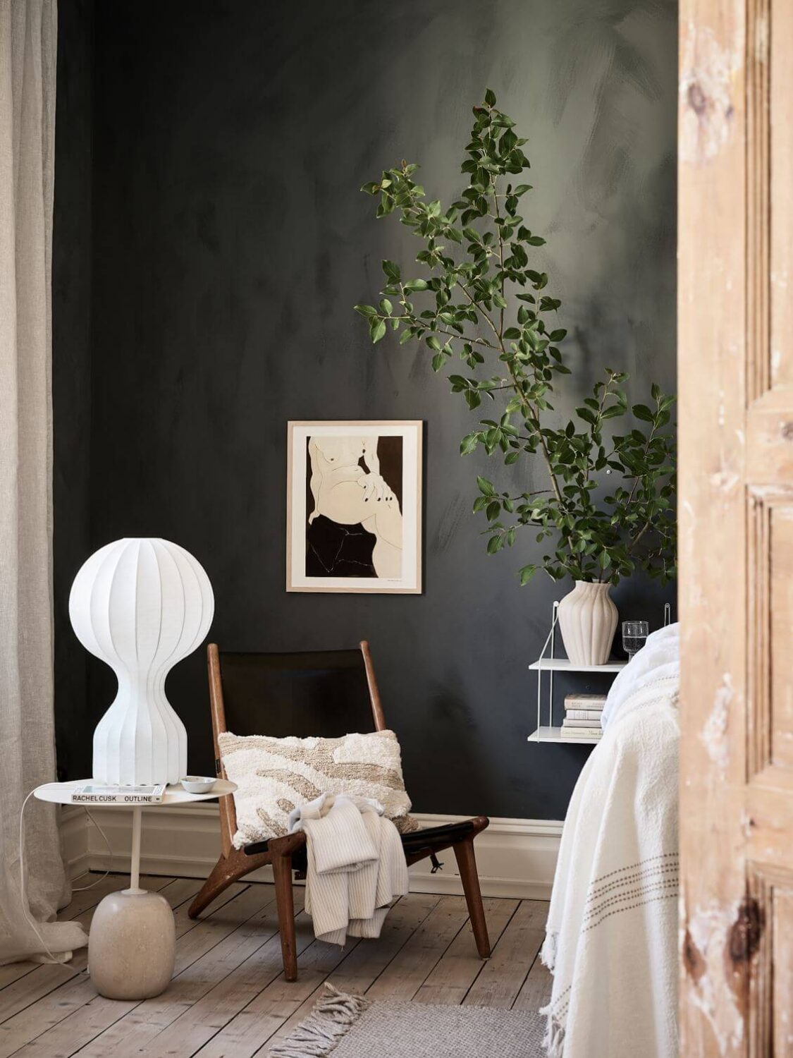 A Swedish Apartment with an Exposed Brick Wall 11 bedroom-detail-dark-gray-wall-nordroom