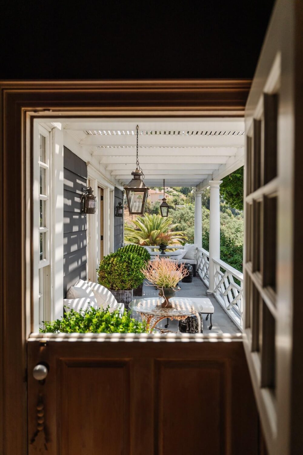 Black Accents in a Traditional Los Angeles Home 25 bedroom-dutch-door-veranda-nordroom