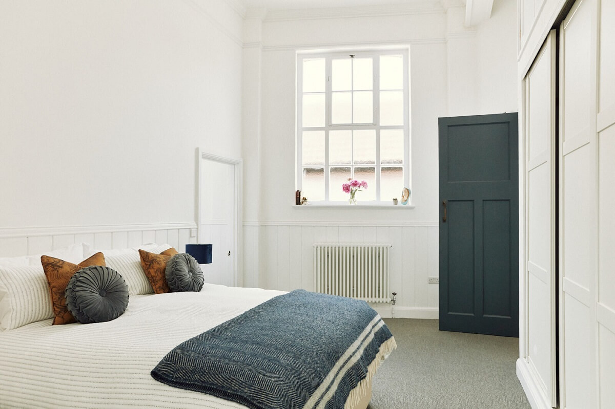 Loft Style Spaces in a Renovated Salvation Army Hall 12 bedroom-gray-carpet-renovated-home-devon-nordroom