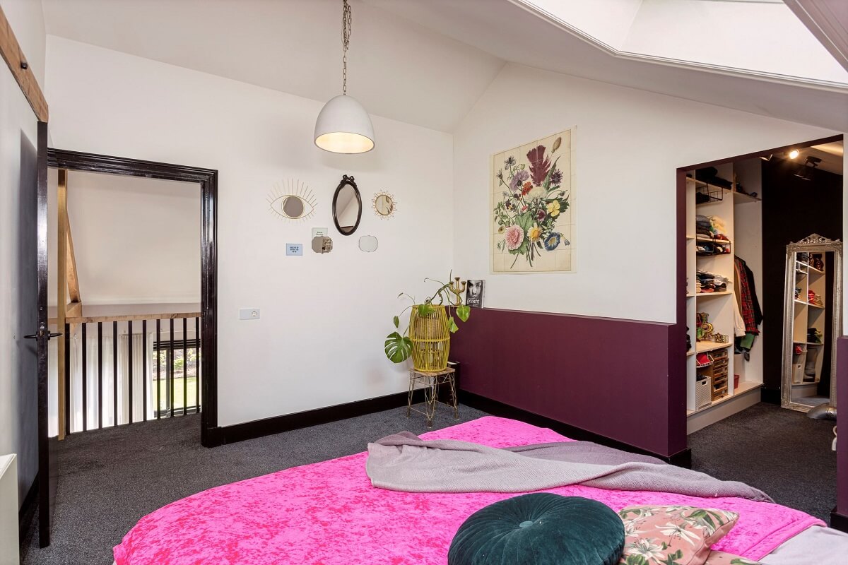 A Colorful School Conversion in The Netherlands 12 bedroom-walk-in-closet-purple-wall-nordroom