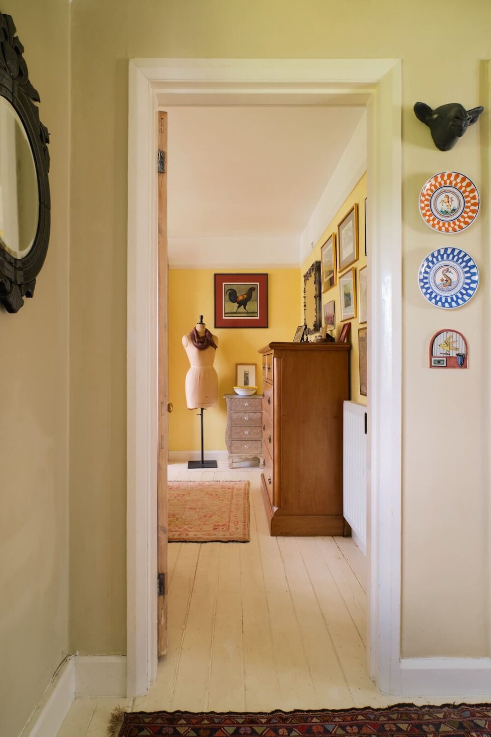An English Cottage with Blue Color Accents 11 bedroom-yellow-wall-color-wooden-floor-nordroom