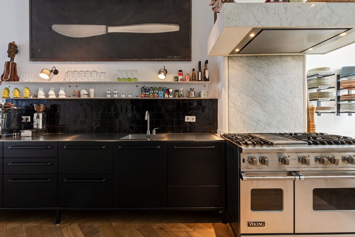 A Family Home in a Historic Canal House 5 black-kitchen-cabinets-black-tiles-nordroom