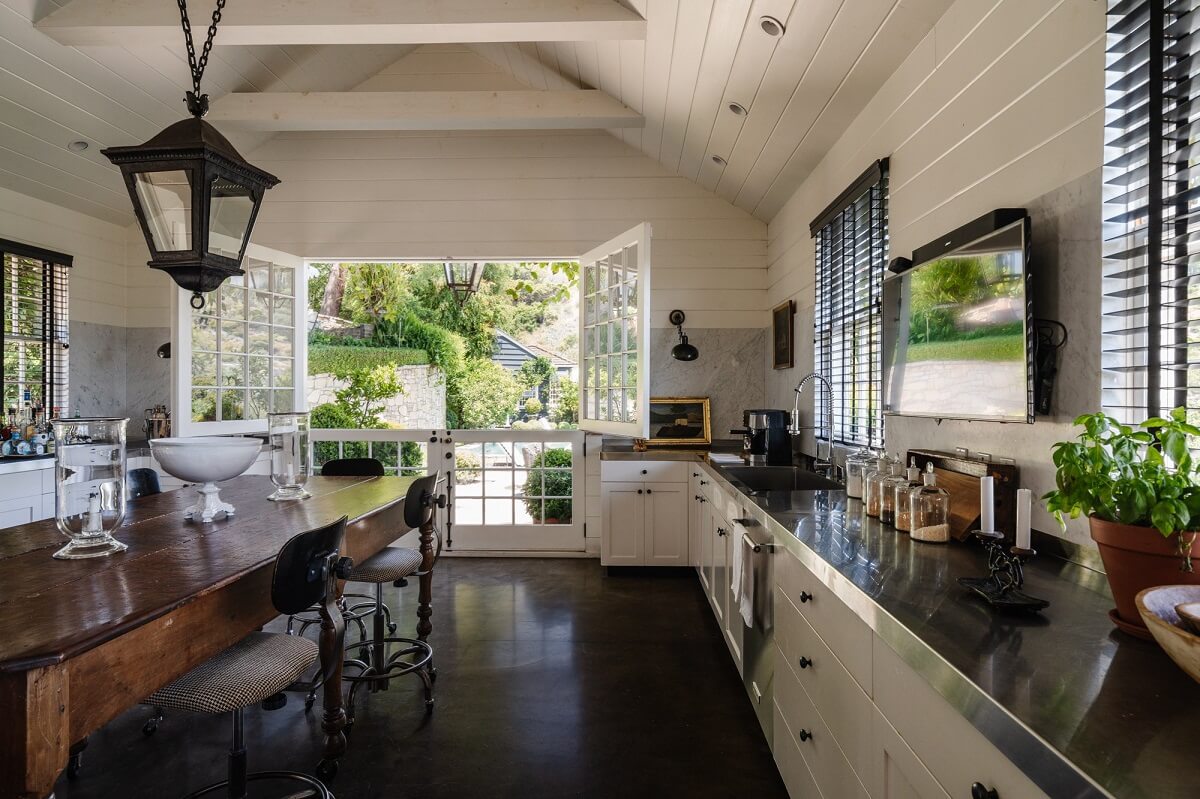 Black Accents in a Traditional Los Angeles Home 3 black-white-kitchen-pitched-ceiling-wooden-island-nordroom