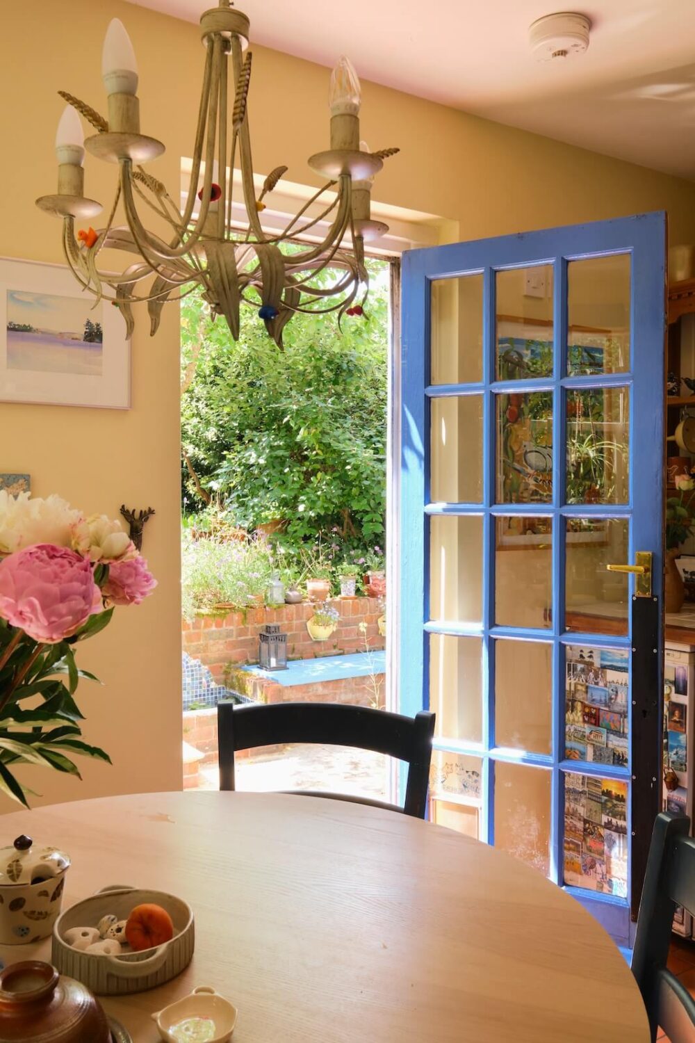 An English Cottage with Blue Color Accents 7 blue-painted-garden-door-cottage-nordroom